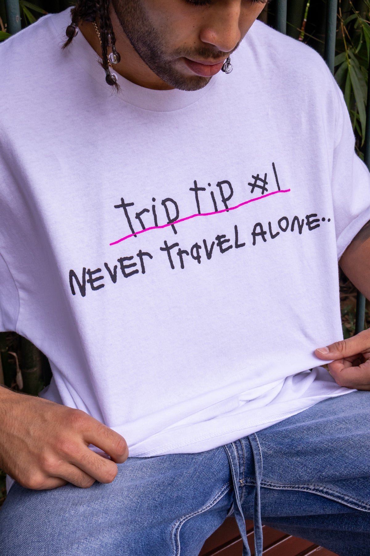 Ned’s on Melrose - Trip tip never travel alone T-shirt